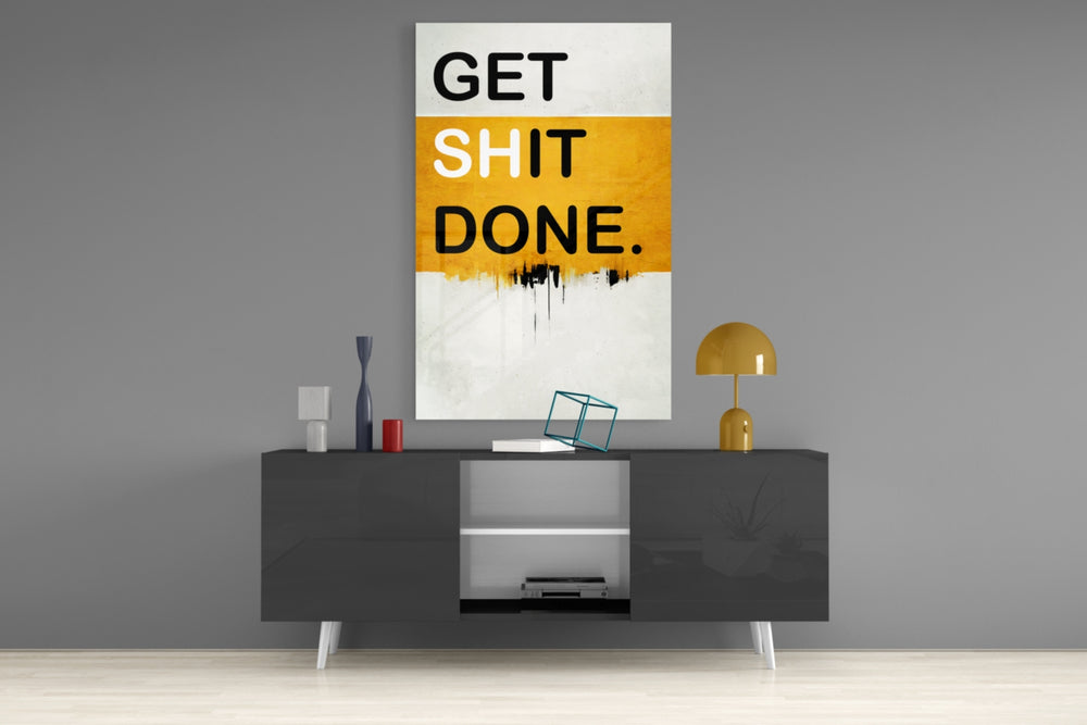 Get Shit Done panel catching lamp light to reveal its bold lettering