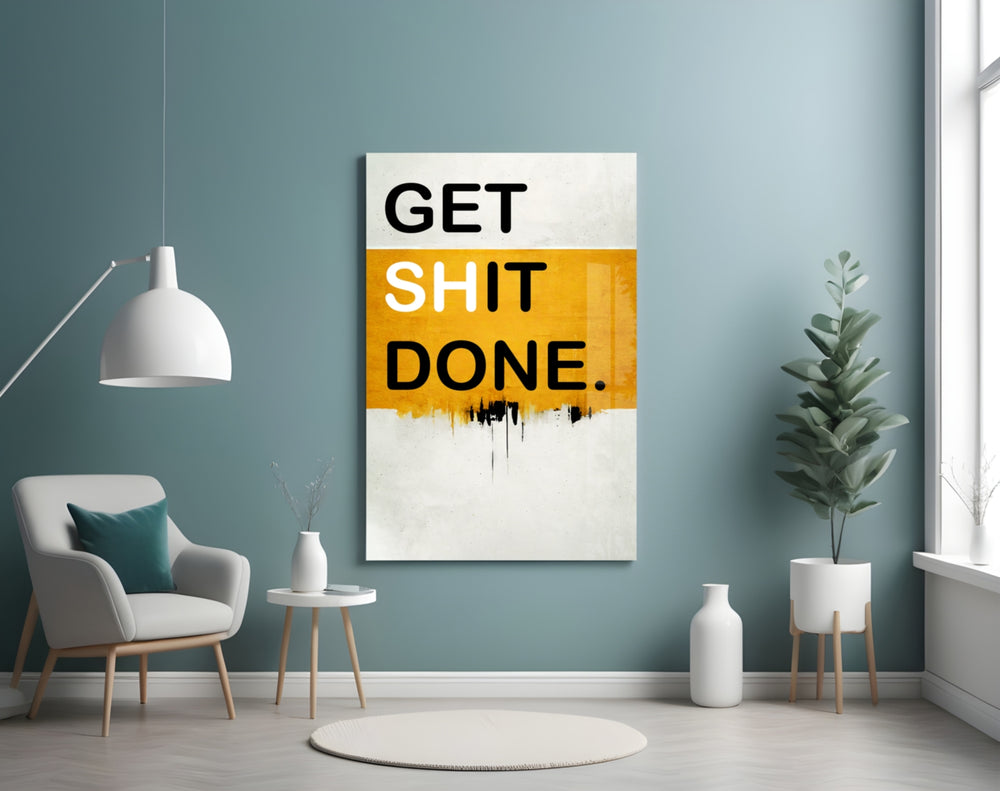 Get Shit Done glass wall art styled above a console in a creative studio