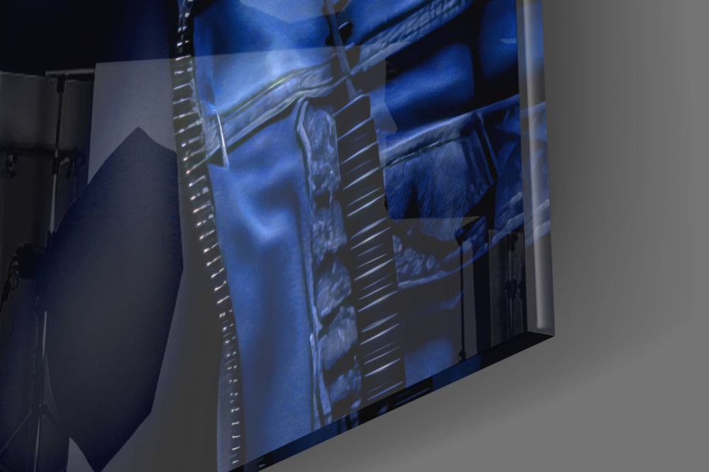 Hooded-muse artwork anchoring a wall with cobalt-and-onyx palette