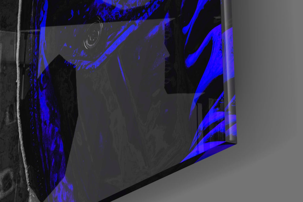 Hooded-muse artwork anchoring a wall with cobalt-and-onyx palette