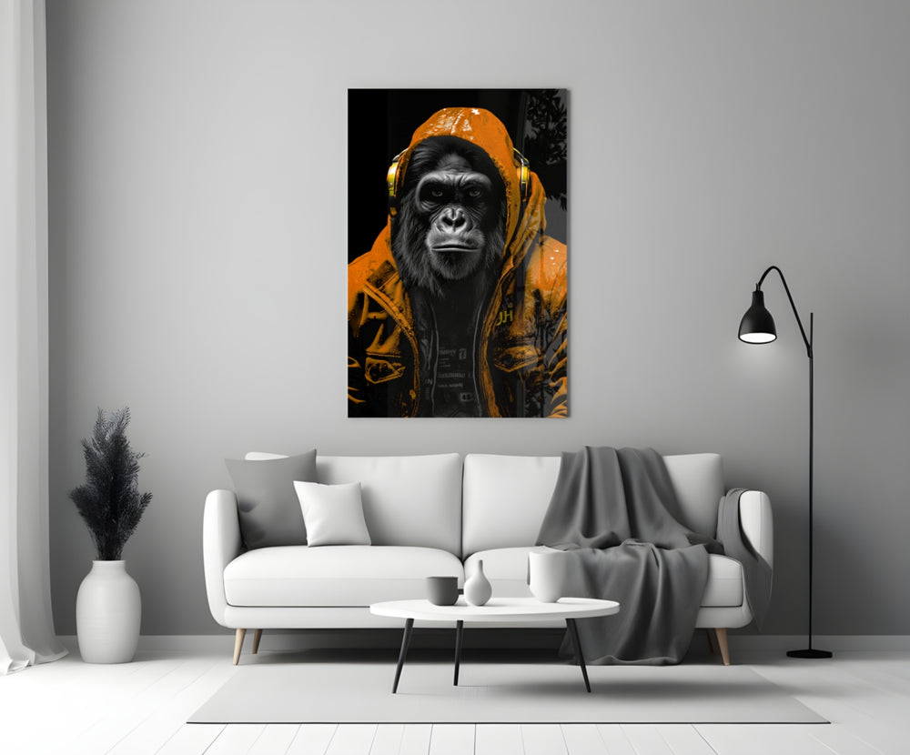 The Ape close-up showing tangerine hoodie and matching headphones