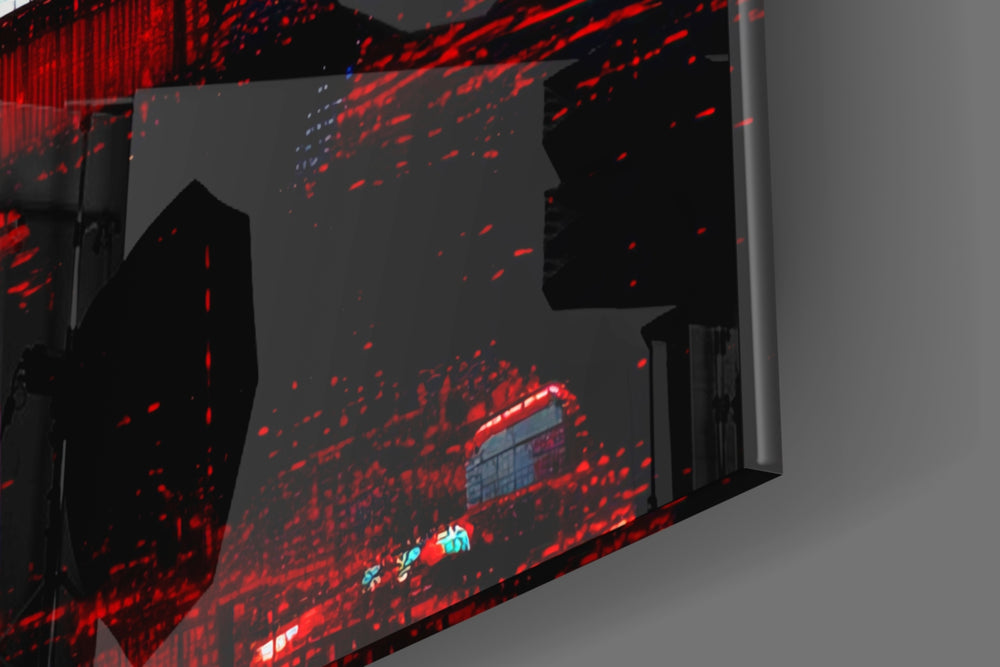 Chrome-muse artwork anchoring a wall with scarlet-and-onyx palette