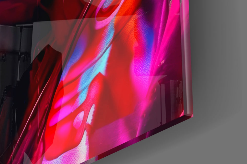 Beanie-muse artwork anchoring a wall with magenta-and-amber palette