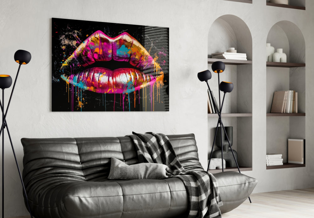 Lips glass wall art styled above a velvet bench in a powder room