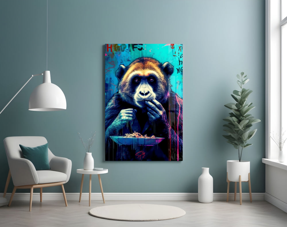 Hungry Monkey glass wall art styled above a sideboard in a media room