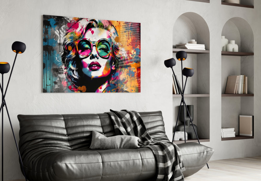 Smarty-Pants glass wall art styled above a console in a creative office