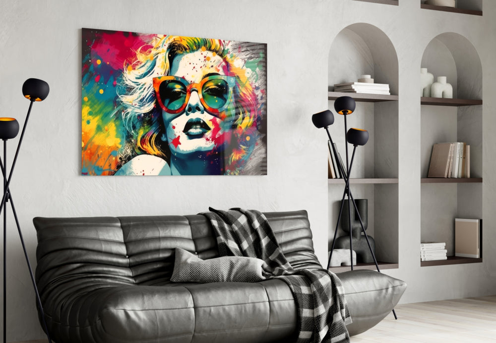 Smarty-Pants glass wall art styled above a console in a creative office