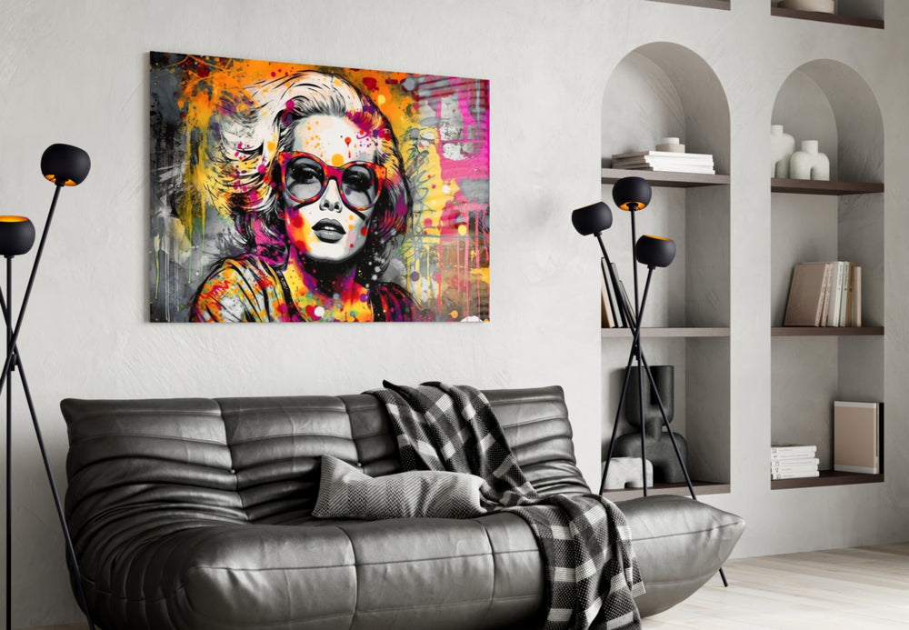 Smarty-Pants glass wall art styled above a console in a creative office