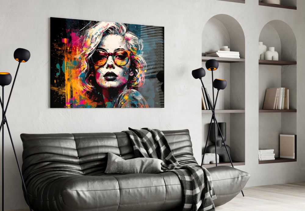 Smarty-Pants glass wall art styled above a console in a creative office