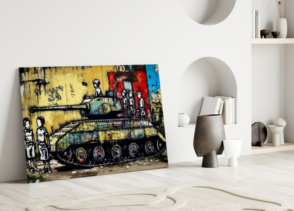 Children of War close-up showing tank, children and graffiti wall