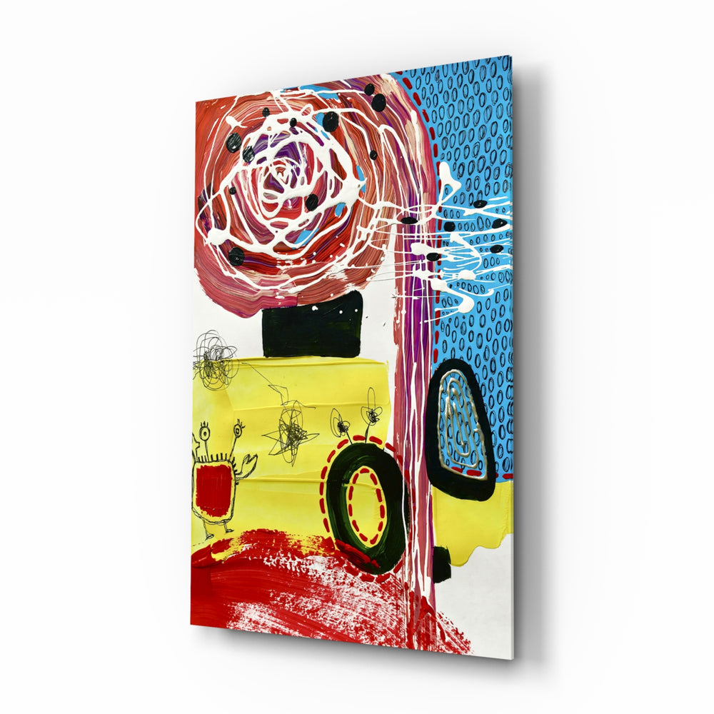 Mix glass wall art displayed above a desk in a creative office