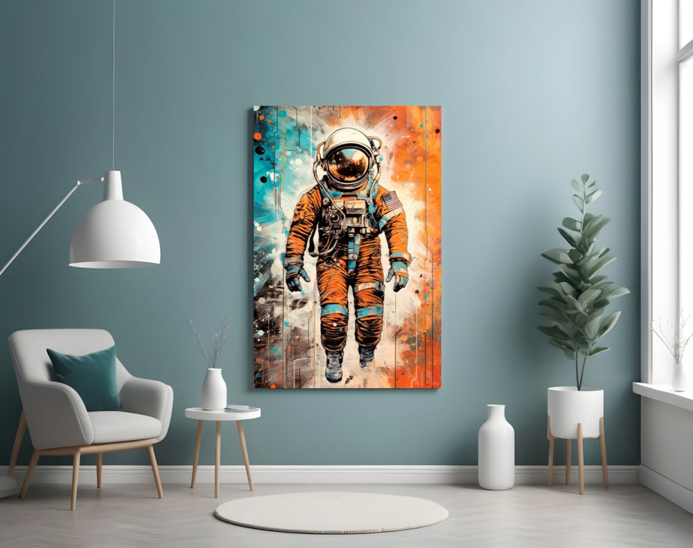 Astronaut glass wall art styled above a sideboard in a creative office