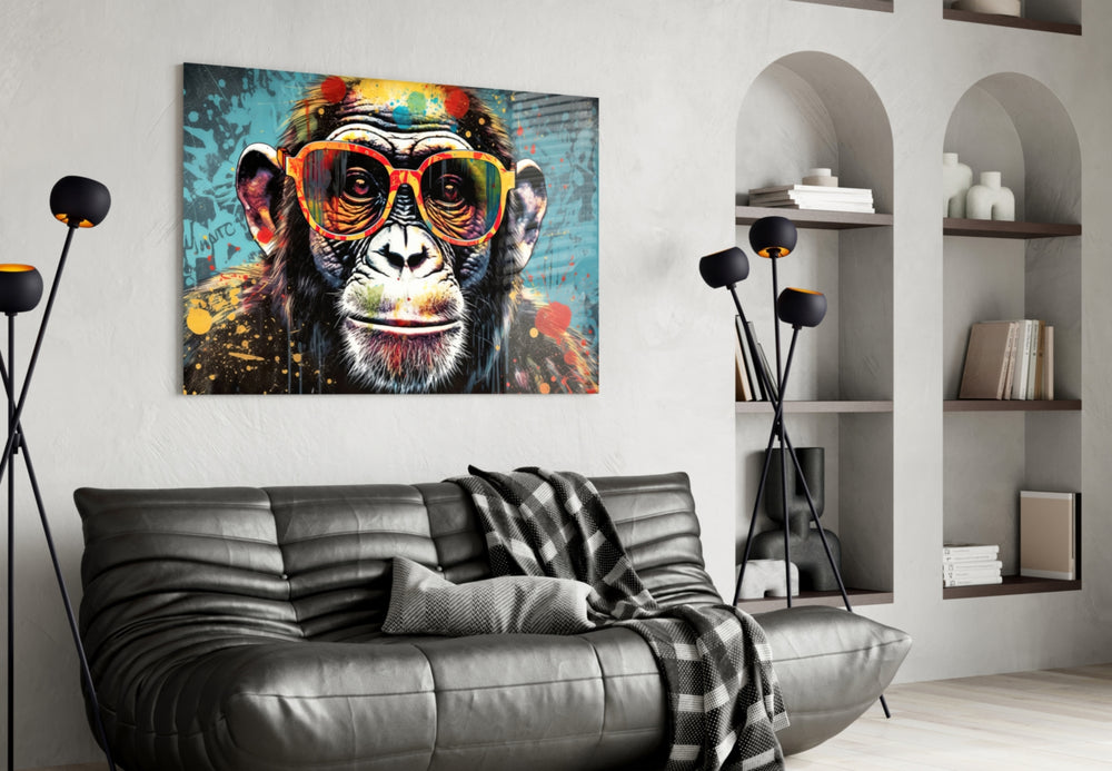 Cool Monkey glass wall art styled above a sideboard in a media room