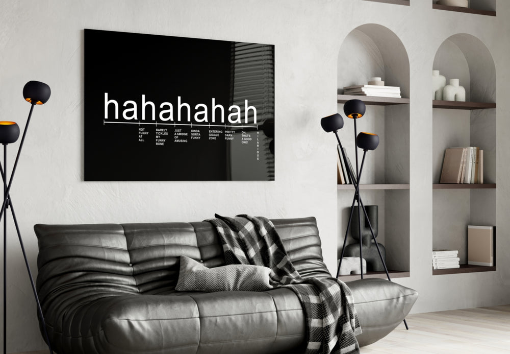 Laughter Analysis glass wall art styled above a sideboard in a media room