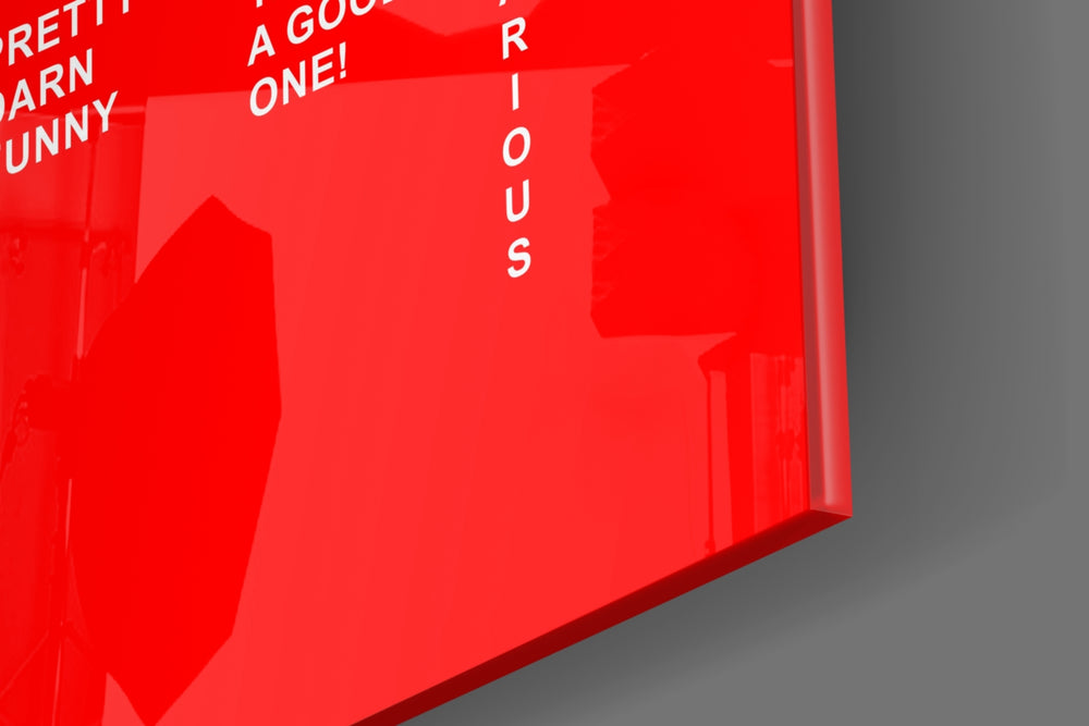 Typography artwork anchoring a wall with scarlet-field palette