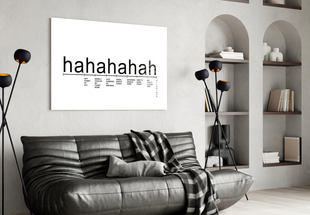 Laughter Analysis glass wall art styled above a sideboard in a media room