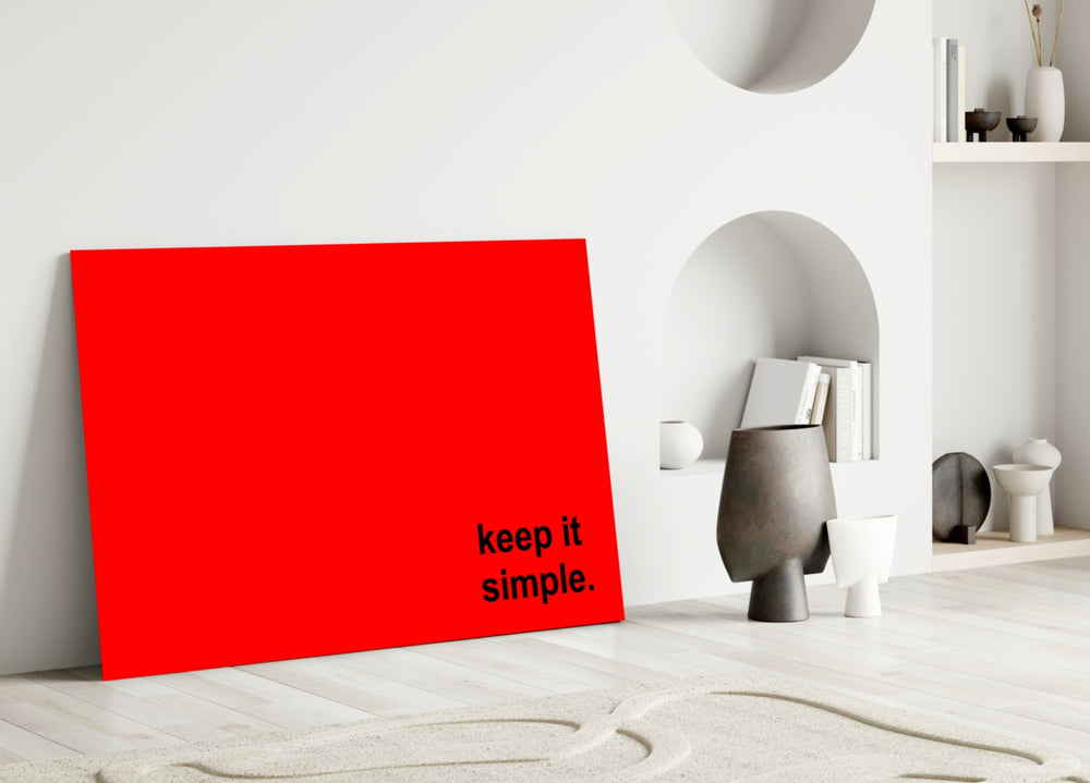 Simple close-up showing lowercase black sans-serif on scarlet