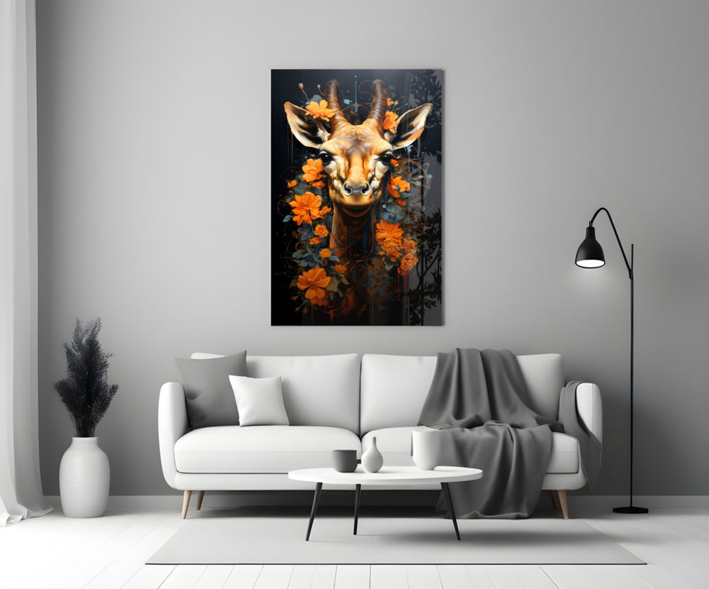 Deer close-up showing antelope head and tangerine blooms