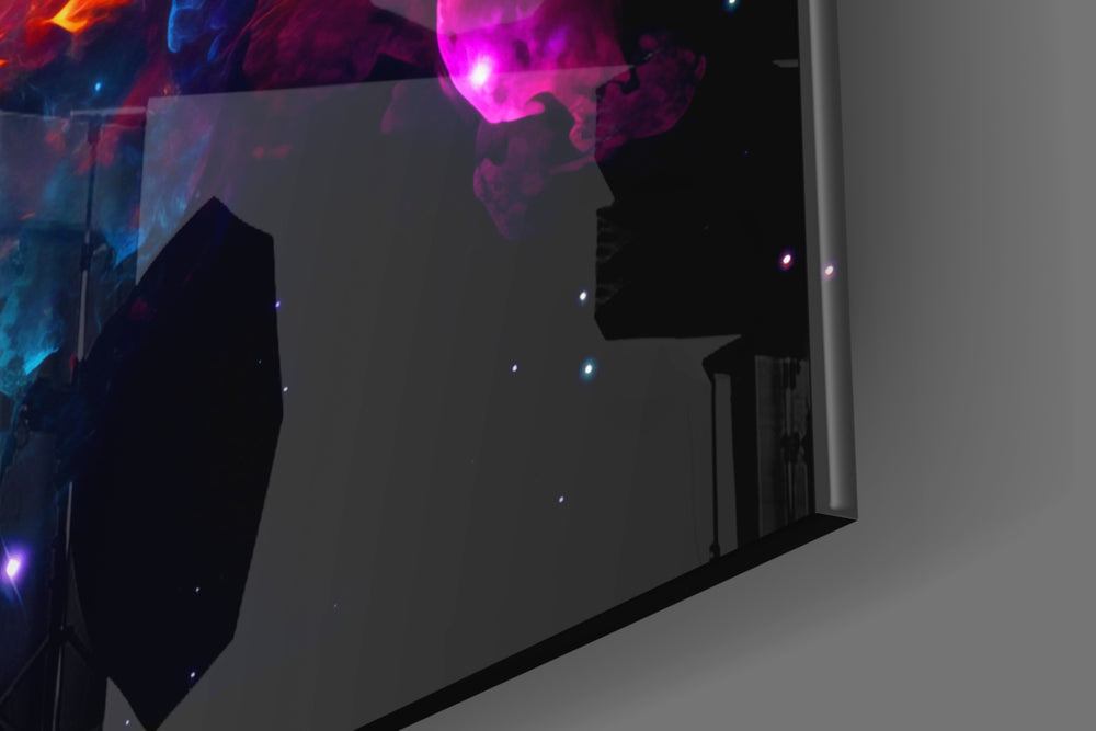 Cosmic-burst artwork anchoring a wall with cyan-and-magenta palette