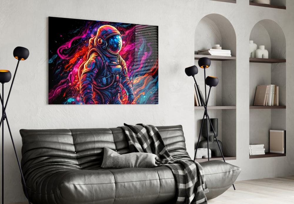 Astronaut glass wall art styled above a sideboard in a creative office