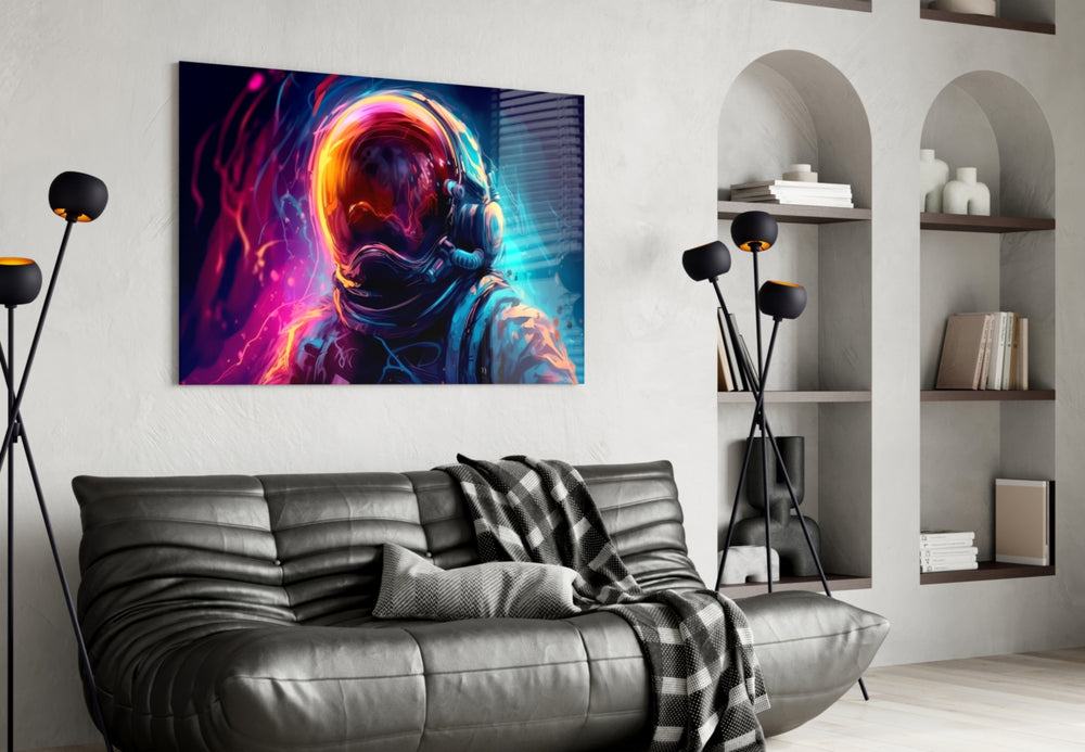 Astronaut glass wall art styled above a sideboard in a creative office