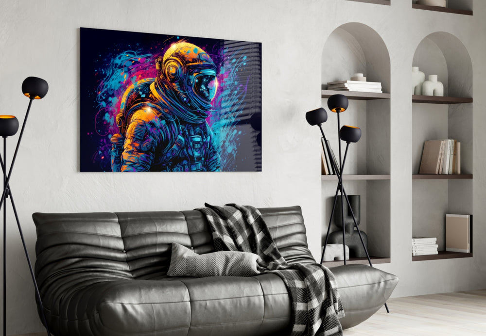 Astronaut glass wall art styled above a sideboard in a creative office