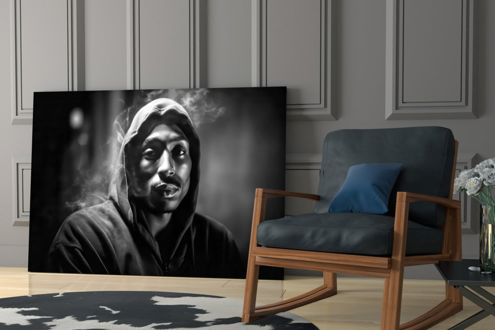 Hip-hop-icon artwork anchoring a wall with black-and-white palette