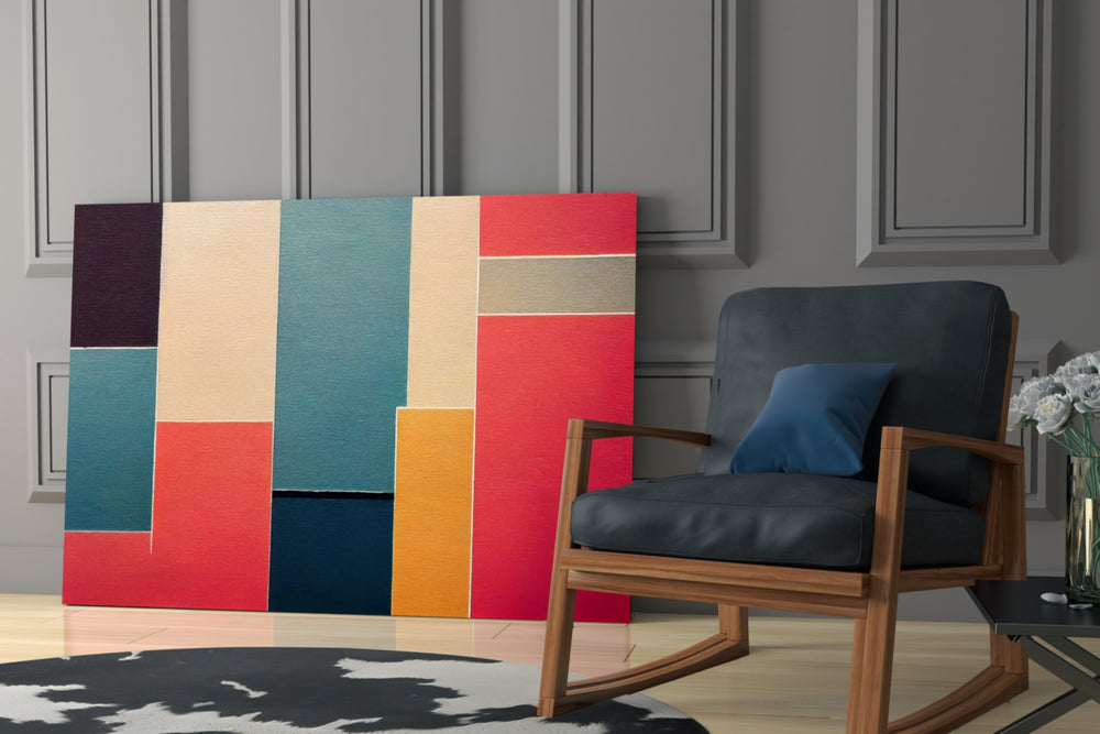 Color-field artwork anchoring a wall with coral-and-teal palette