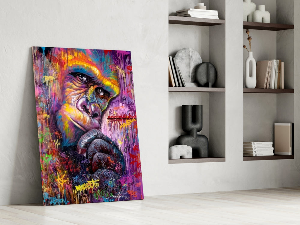 Pensive-ape artwork anchoring a wall with magenta-and-cyan palette