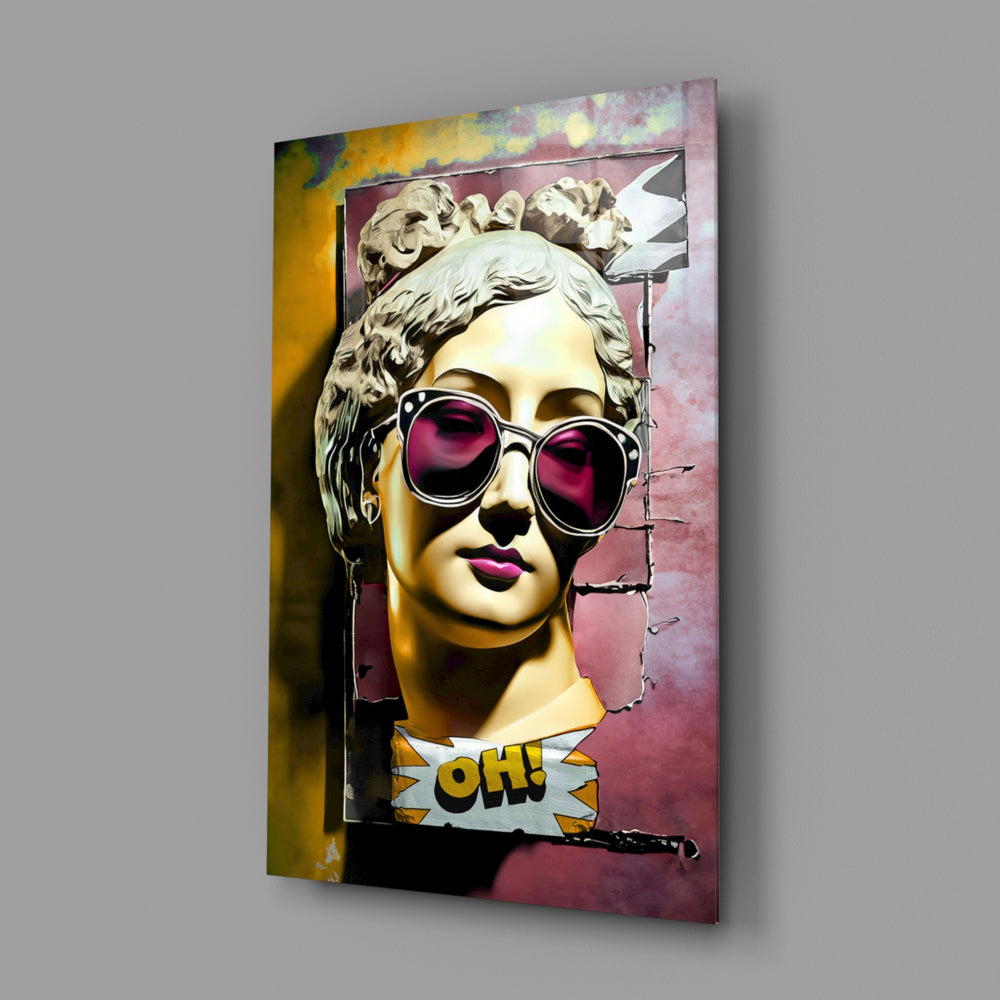 Oh close-up showing gold-ivory bust on magenta-mustard backdrop