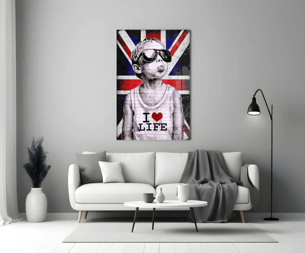 I Love Life glass wall art styled above a console in a media room