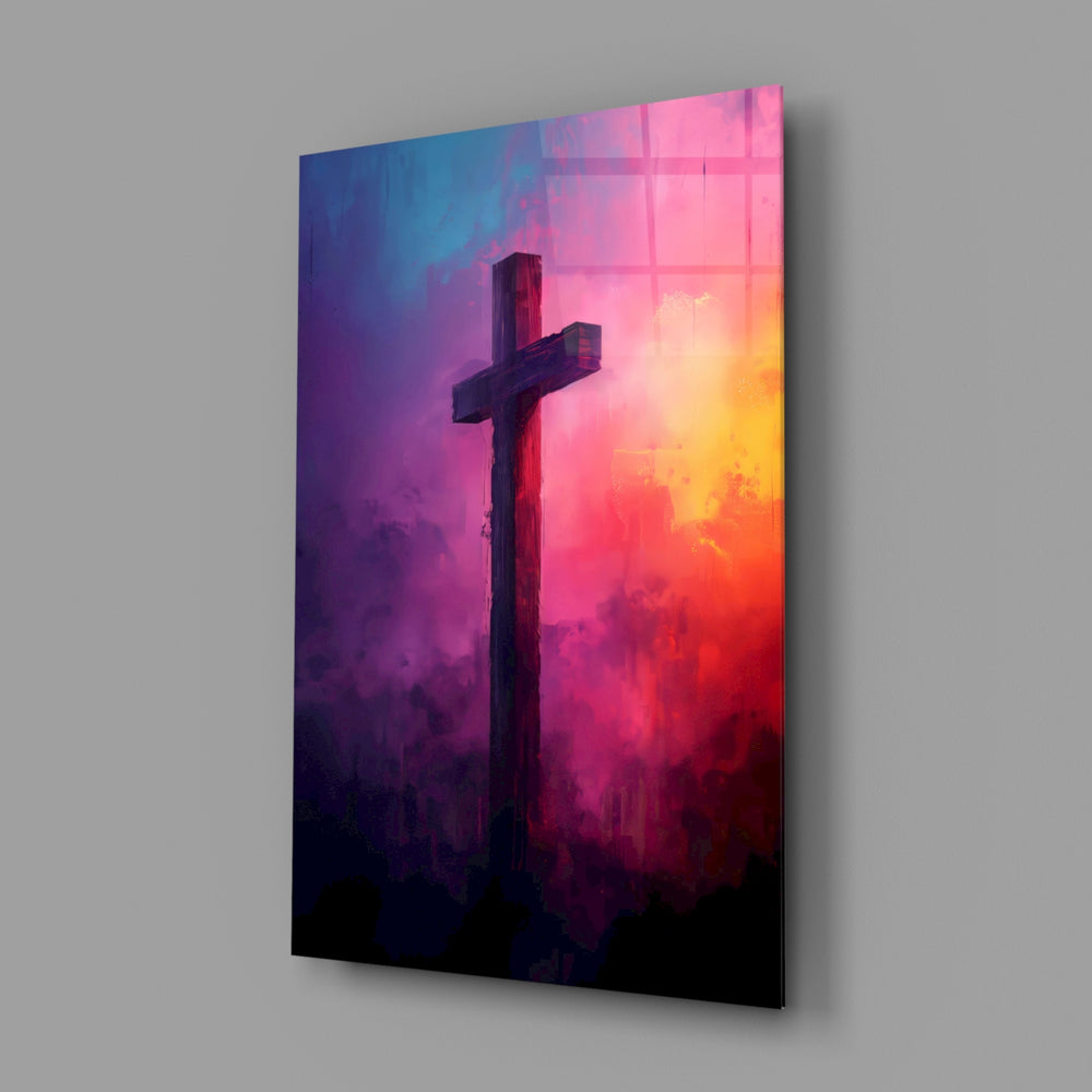 Cross close-up showing silhouette on magenta-violet sky
