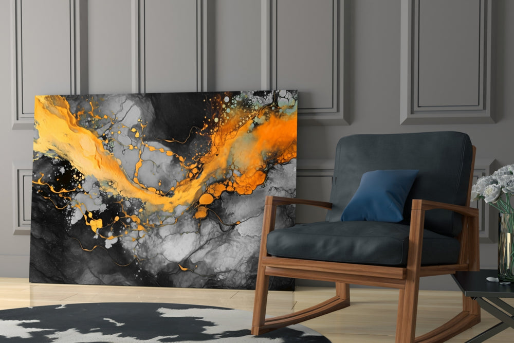 Gold-pour artwork anchoring a wall with tangerine-and-charcoal palette