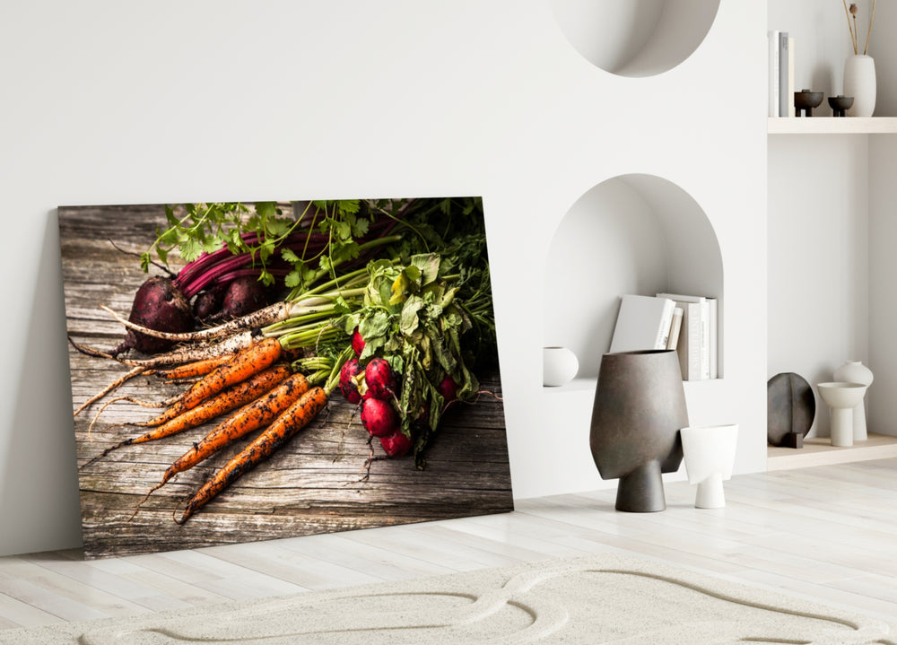 Close-up detail of carrots and red radishes on weathered wood