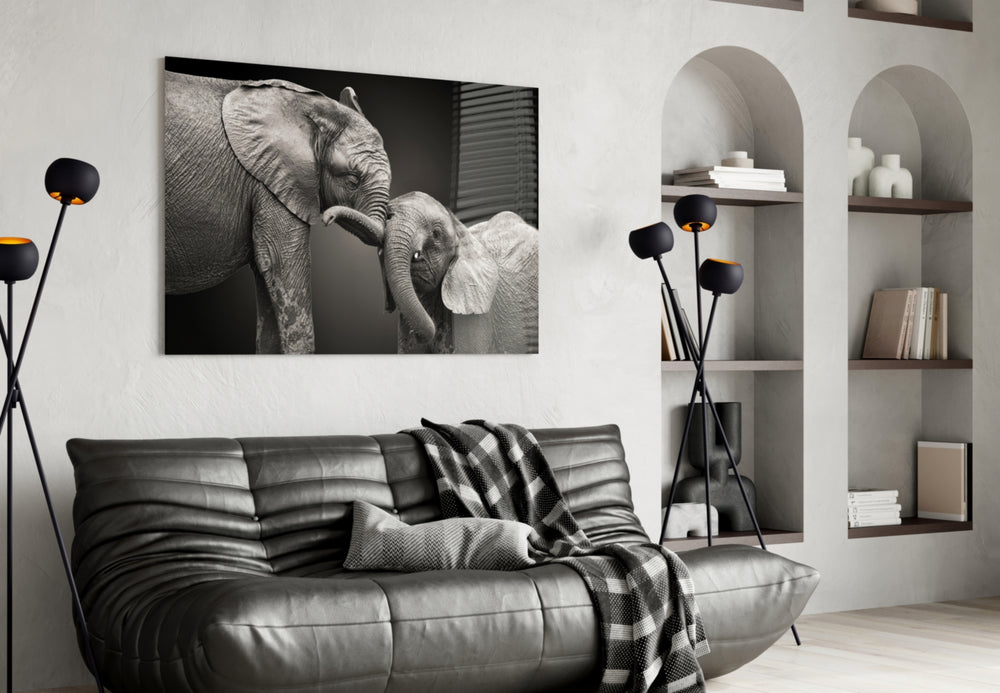 Elephants glass wall art styled above a bed in an affectionate-mood bedroom