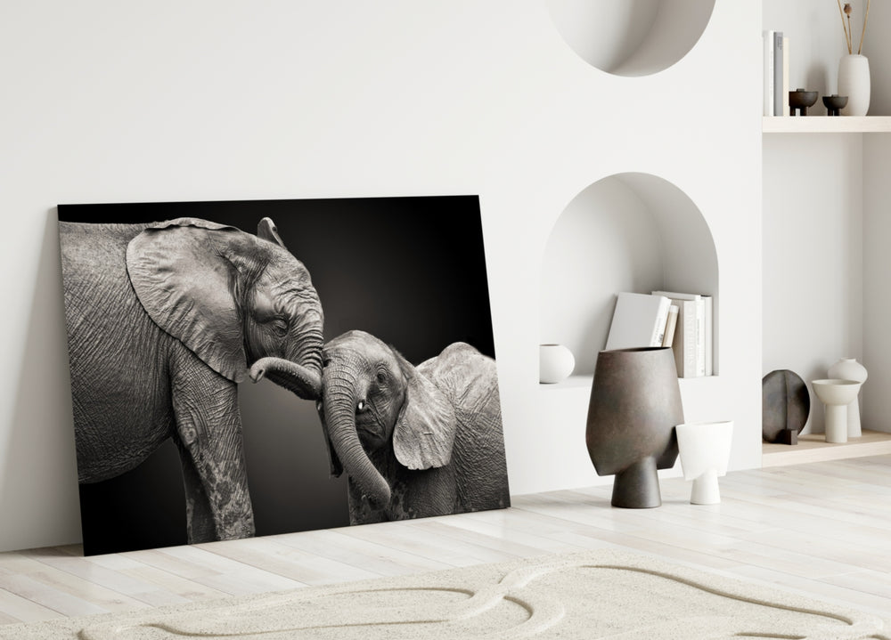 Close-up detail of two elephants intertwining trunks