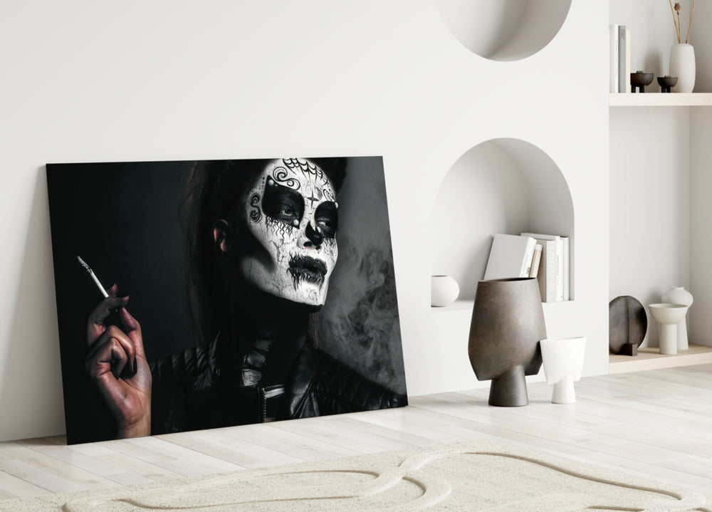 Close-up detail of the white sugar-skull face paint and drifting smoke
