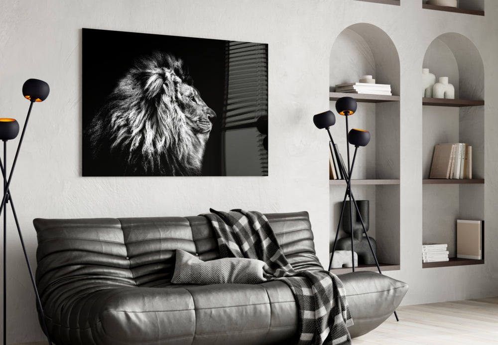 Lion glass wall art styled above a sofa in a leader's living room