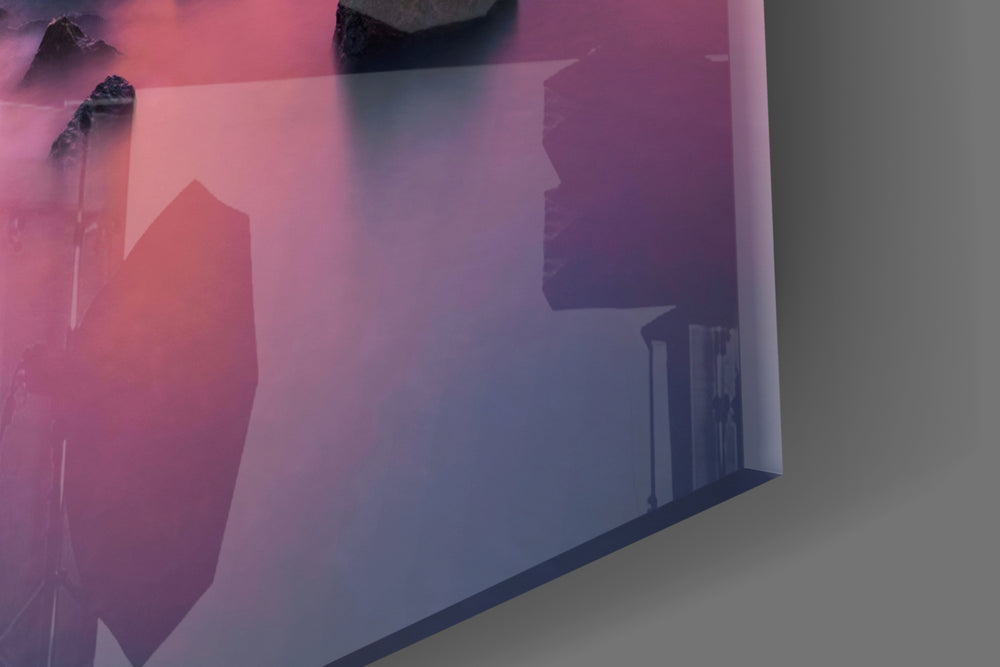 Sunset at Sea artwork anchoring a coastal-themed wall in warm palette