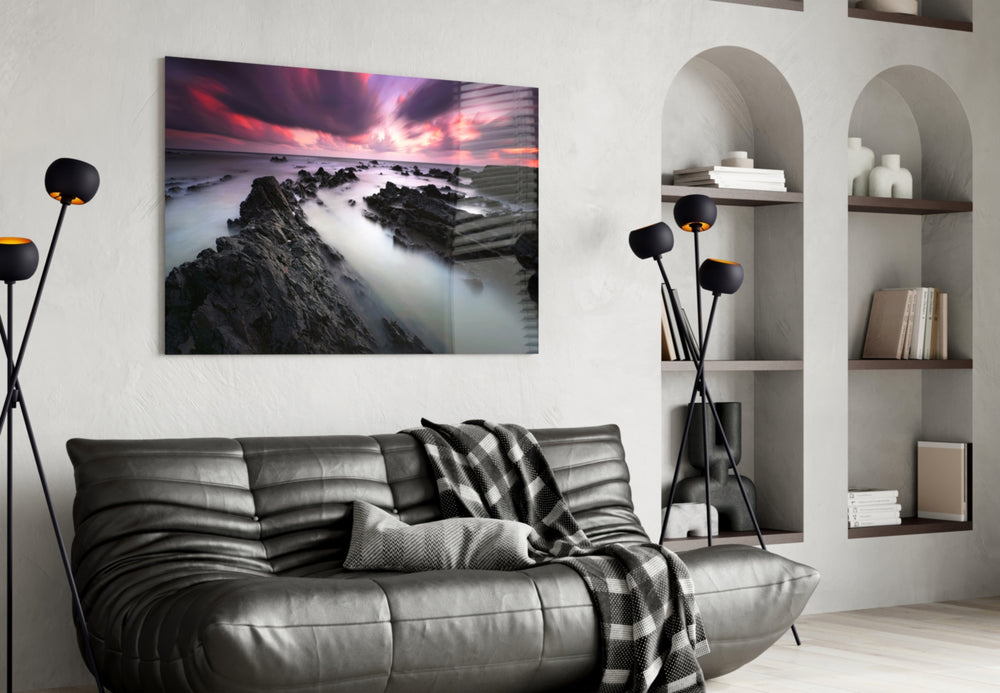 Sunset Landscape glass wall art styled above a sofa in a cinematic living room
