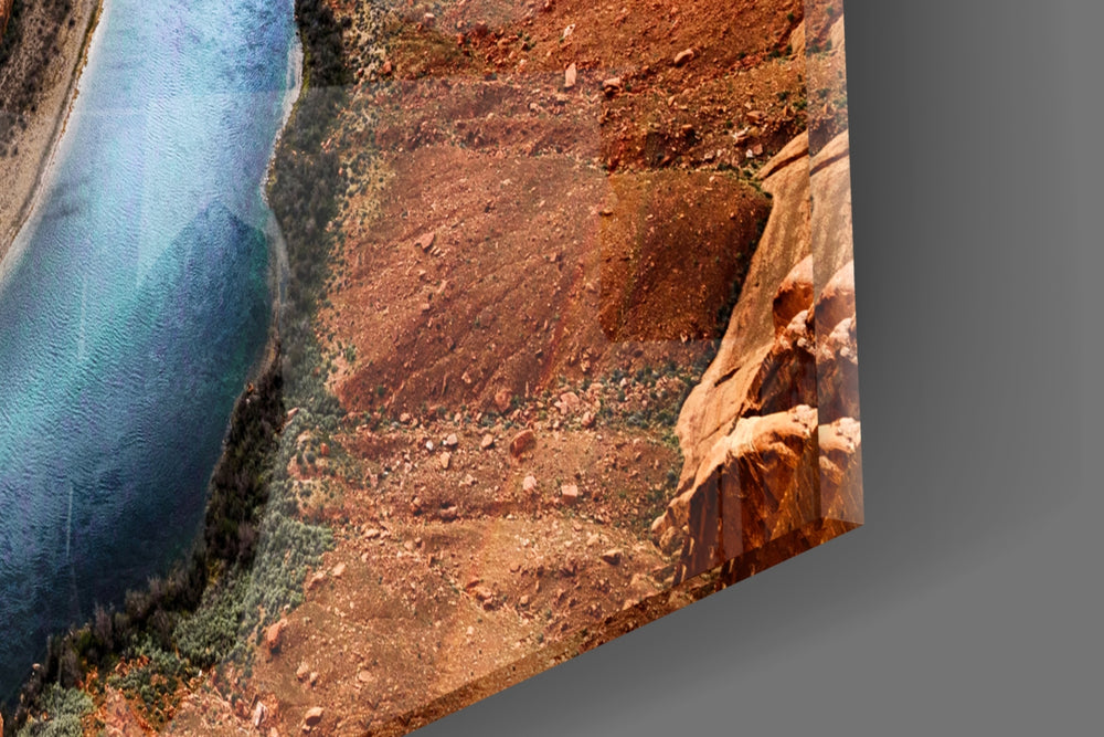 Canyon artwork anchoring a southwestern-themed wall in warm palette
