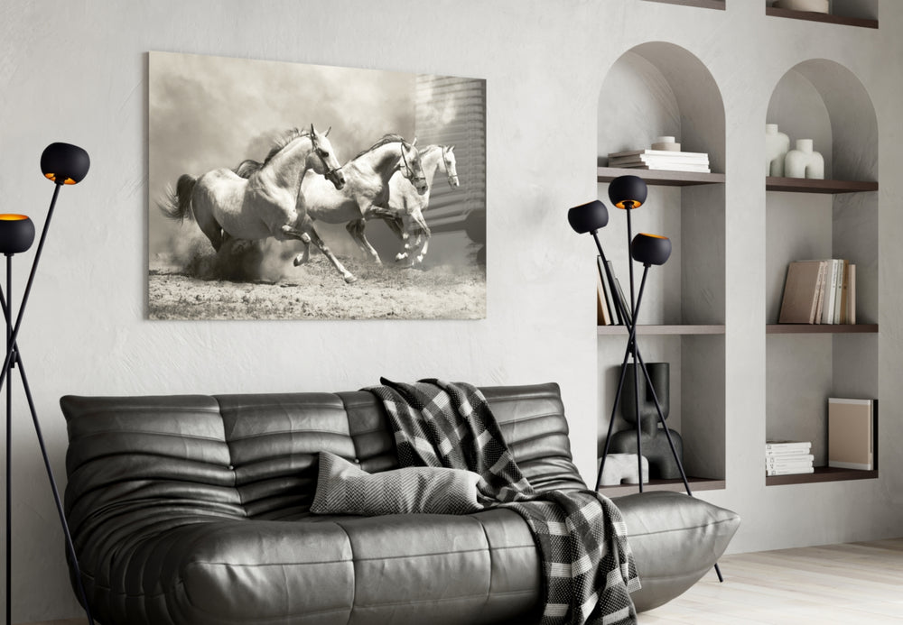 Running Horses glass wall art styled above a sofa in an adventurous living room