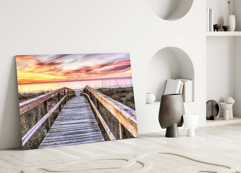 Close-up detail of weathered planks and sea grasses under sunset light