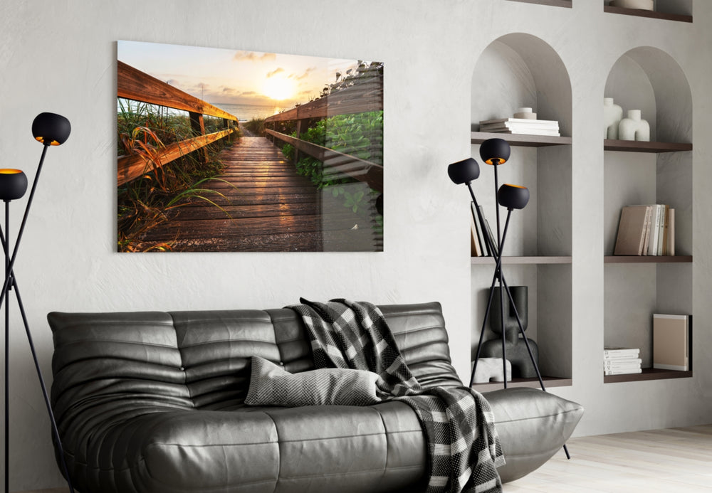 Sunset on the Beach glass wall art styled above a sofa in a seaside-mood living room