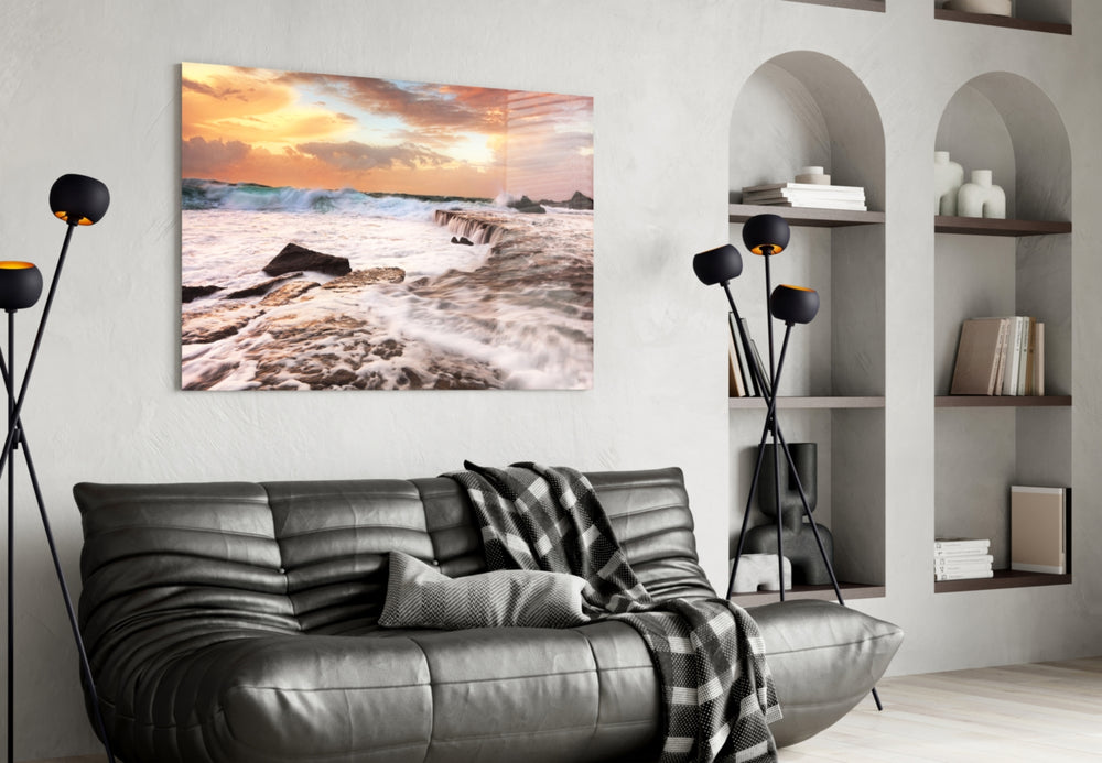 Vicious Waves glass wall art styled above a sofa in a cinematic living room