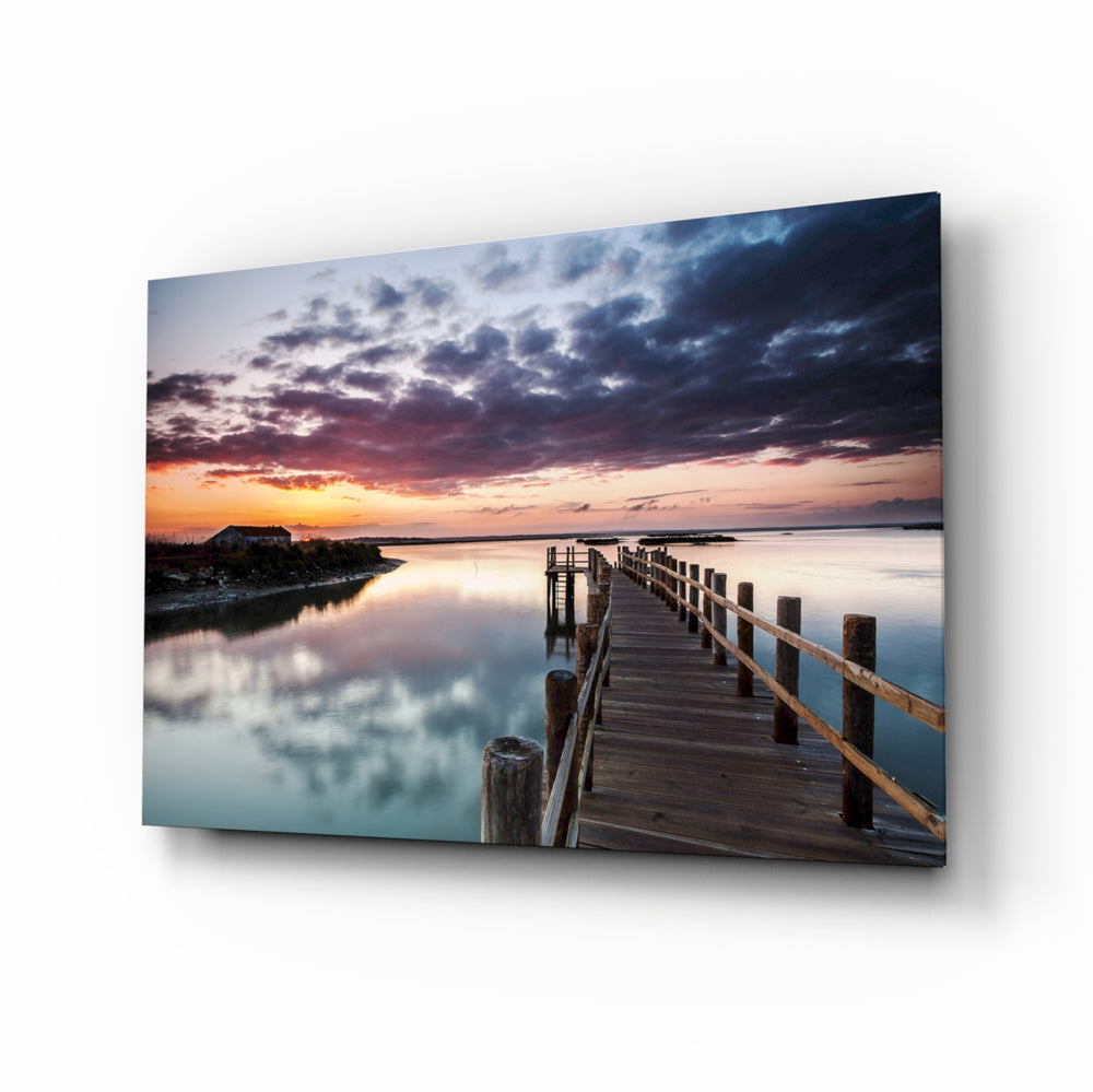 Sunset on the Beach glass wall art displayed above a console in a designer interior