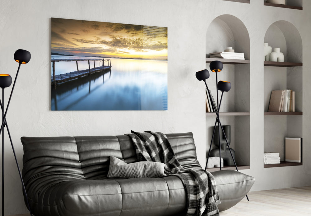 Sunset on the Beach glass wall art styled above a sofa in a retreat-mood living room