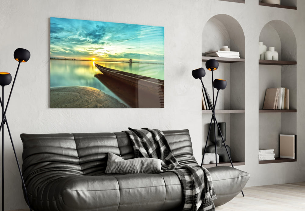 Kayak on the Beach and Sunset glass wall art styled above a sofa in a retreat-mood living room