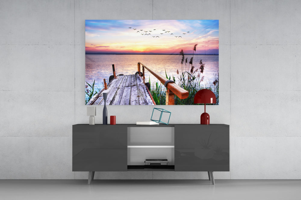 Dock panel catching soft light to reveal its watercolor sky