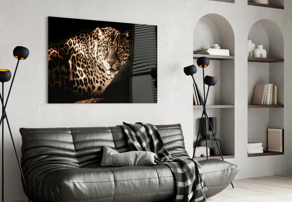 Leopard glass wall art styled above a desk in an explorer-presence study